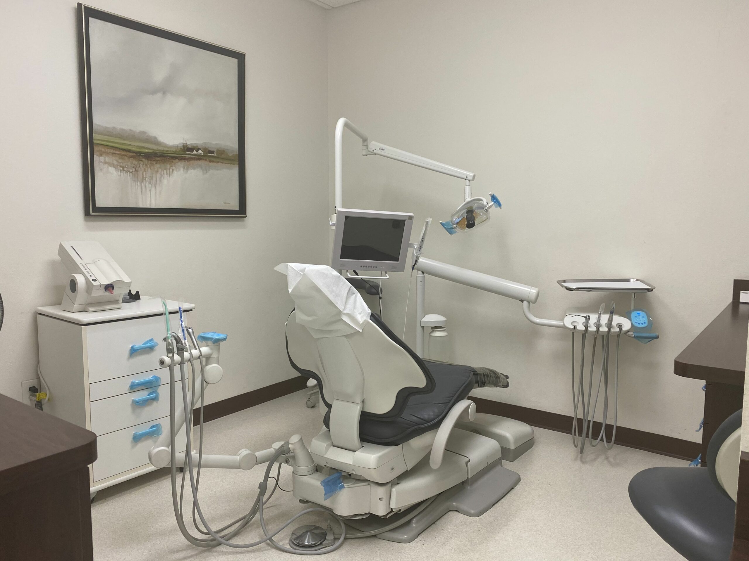 Modern dental chair and treatment area at McCoy Dental