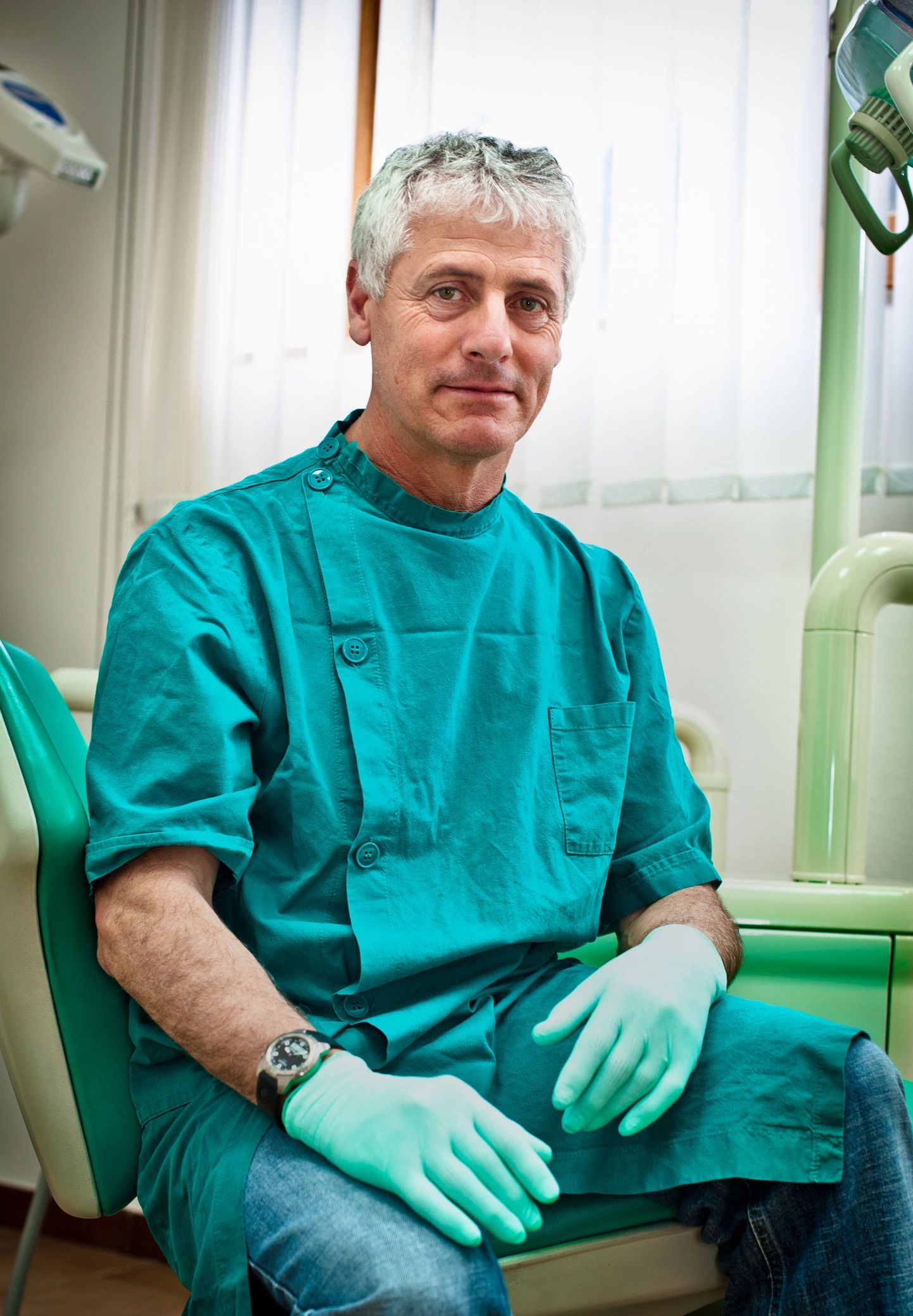 Dentist sitting in office