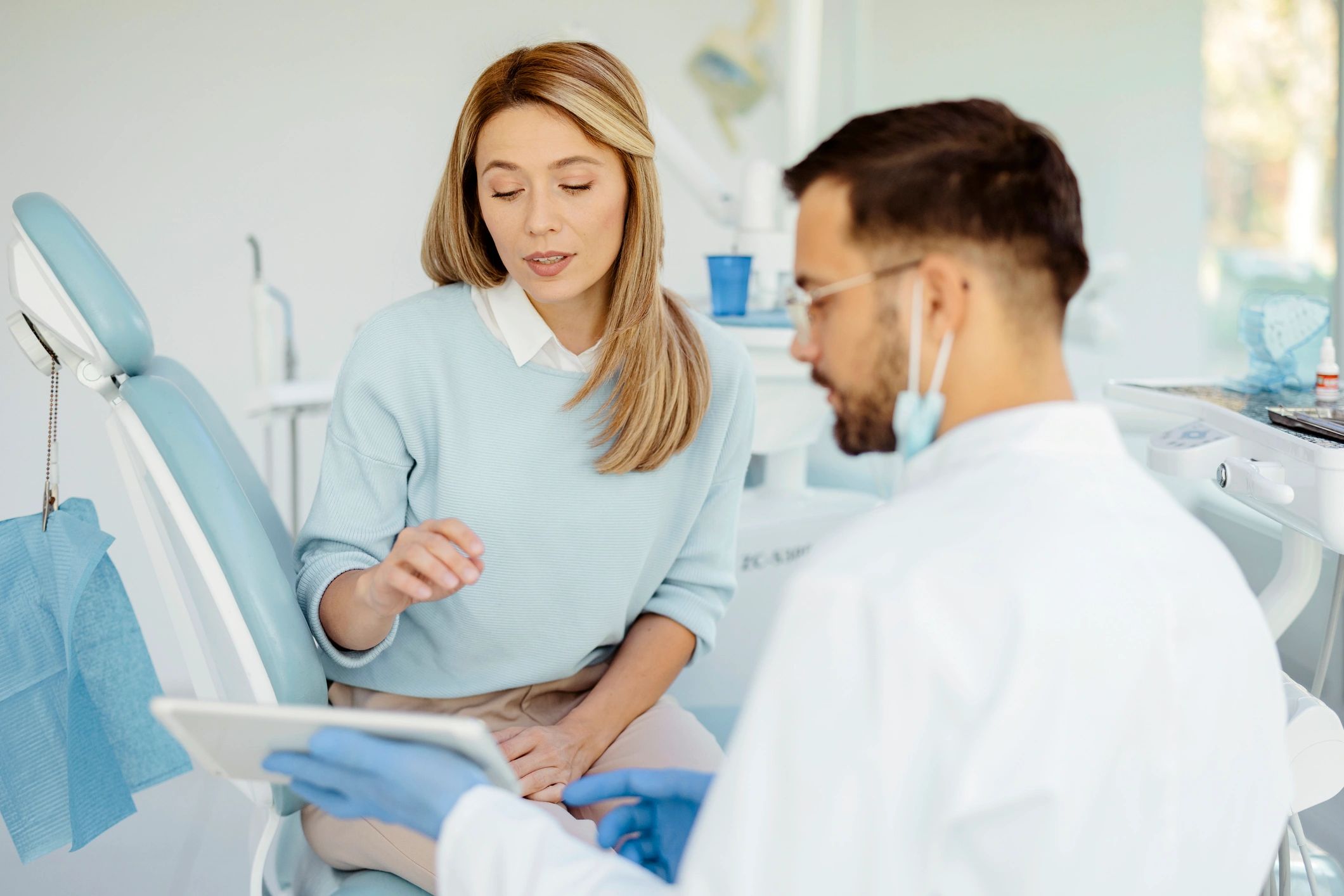 Dentist discussing treatment options with a patient