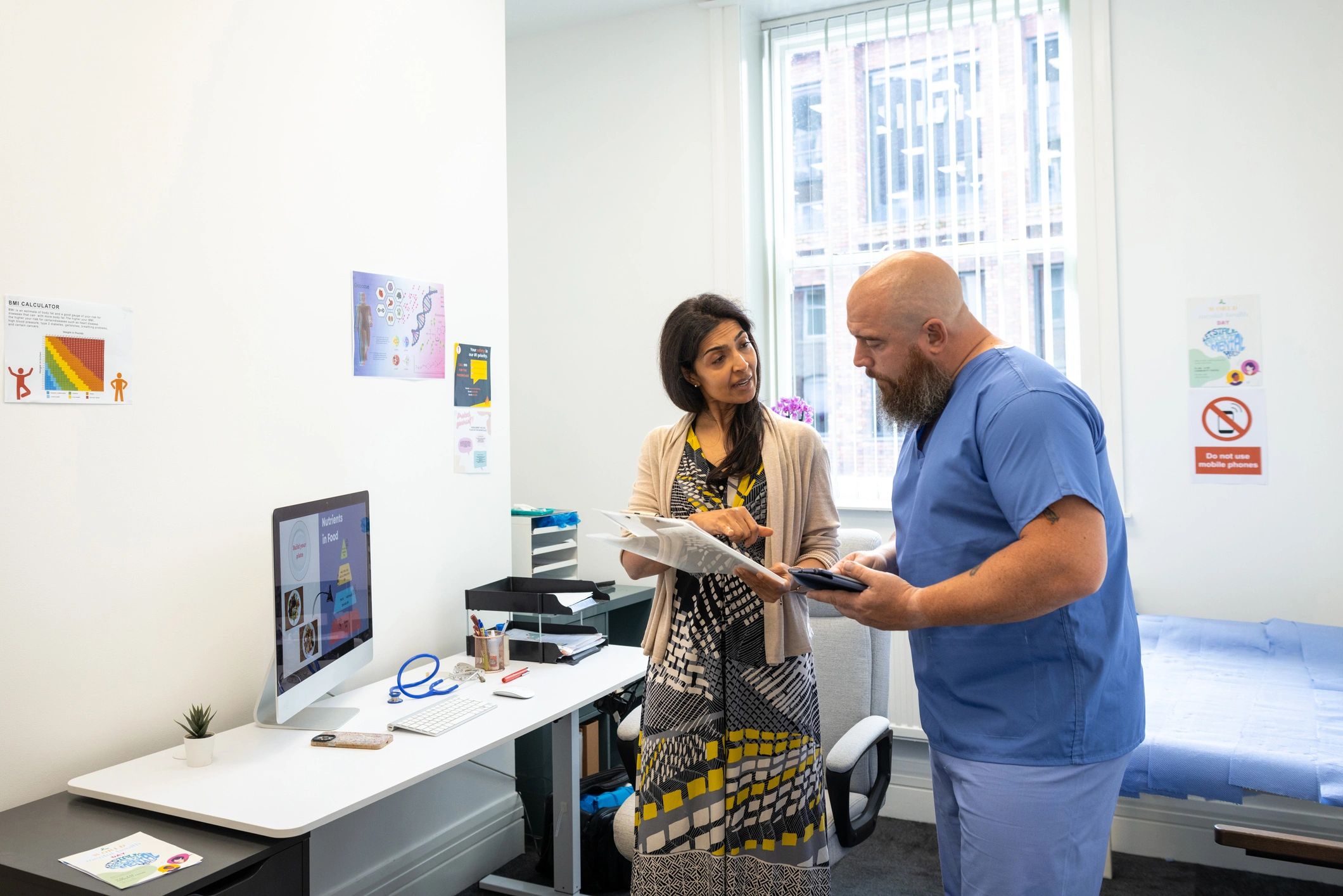 Dental team discussing patient care in a modern office