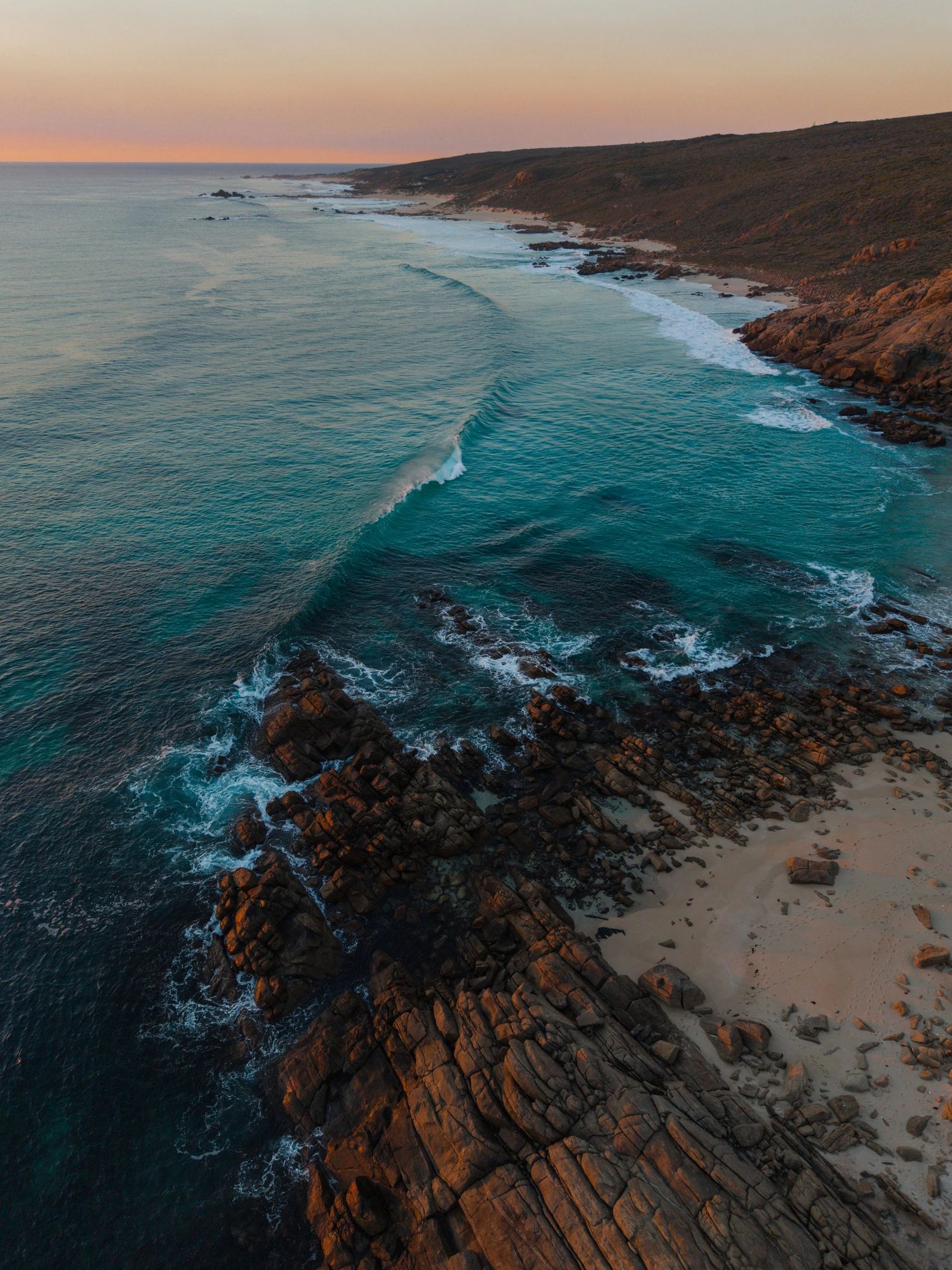 Home Warm sunny coastal beach scene with turquoise water and shoreline